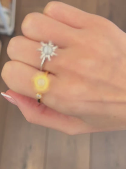 Anillo sol giratorio
